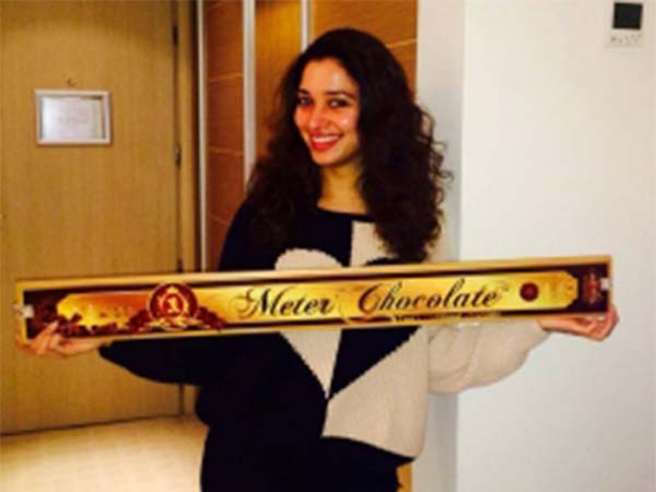 Rajamouli Gifted A Chocolate To Tamanna Rajamouli Gifted A Chocolate To Tamanna