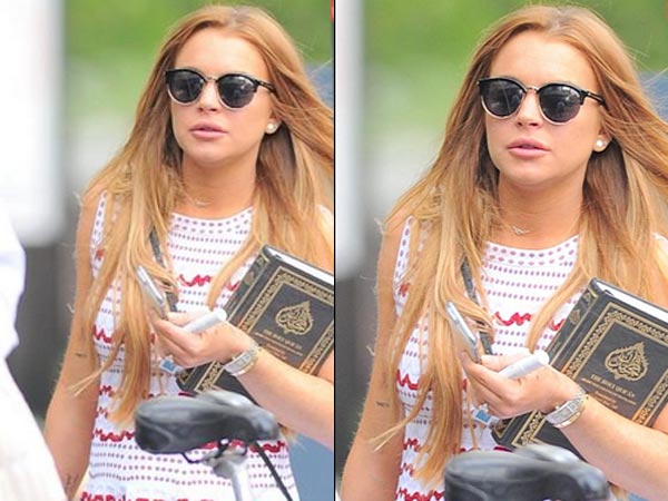 Lindsay Lohan Snapped With Quran In Hand, Converting To Islam? Lindsay Lohan Snapped With Quran In Hand, Converting To Islam?