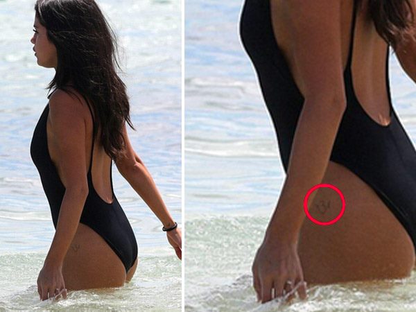 Selena Gomez Slips Into Bikini On Miami Beach, Shows 'Om' Tattoo On Thigh Selena Gomez Slips Into Bikini On Miami Beach, Shows 'Om' Tattoo On Thigh