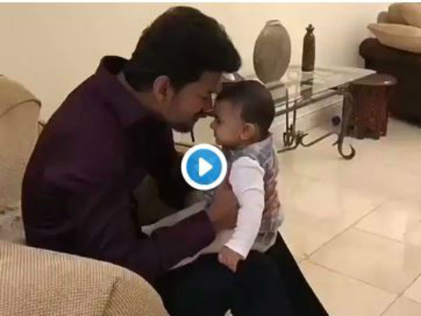 Vijay playing with a baby is cute beyond words Vijay playing with a baby is cute beyond words