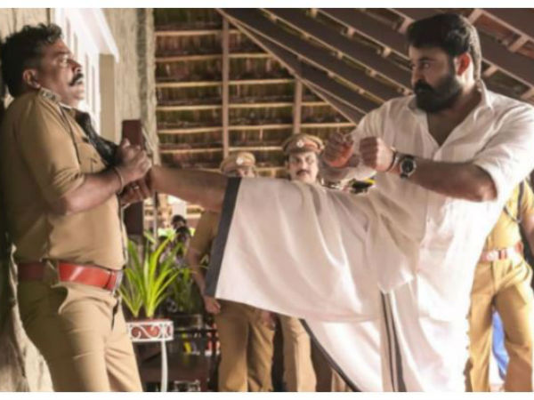 పోలీసుల ఛాతిపై మోహన్లాల్ కాలితో