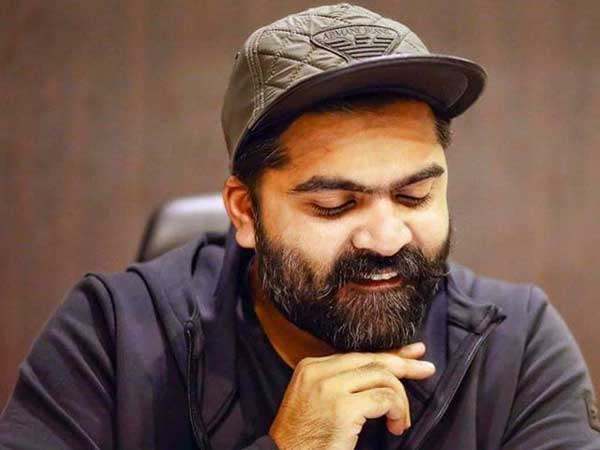 Simbu wearing directors cap Simbu wearing directors cap