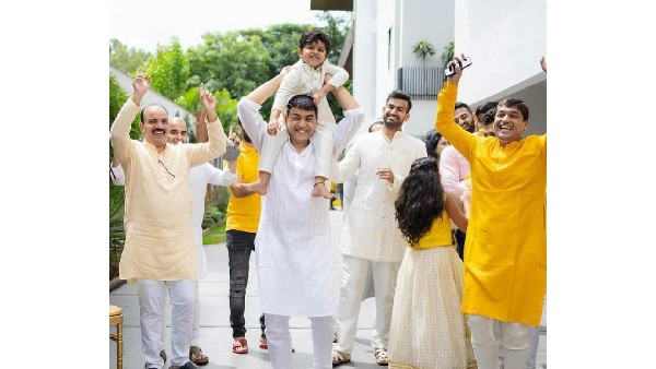 ఆరాన్ష్ ను భుజాలపై ఎత్తుకొని