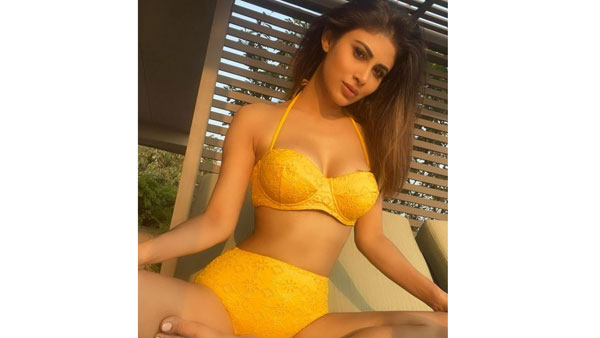 దారుణమైన ఫొటోలతో మౌనీ రచ్చ