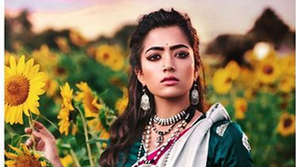 హాట్ ఫోజులతో రష్మిక మందన్న: చీరకొంగును పక్కకు జరిపి మరీ..
