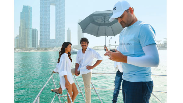 Akkineni Nagarjuna and Sonal Chauhan Chill at Ghost Sets in Dubai Akkineni Nagarjuna and Sonal Chauhan Chill at Ghost Sets in Dubai