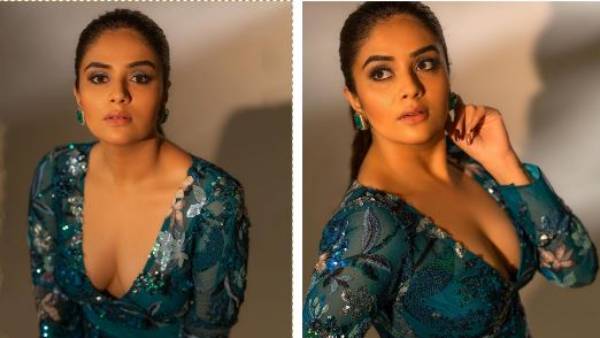 పొట్టి బ్లాక్ డ్రెస్ లో ఘాటుగా..